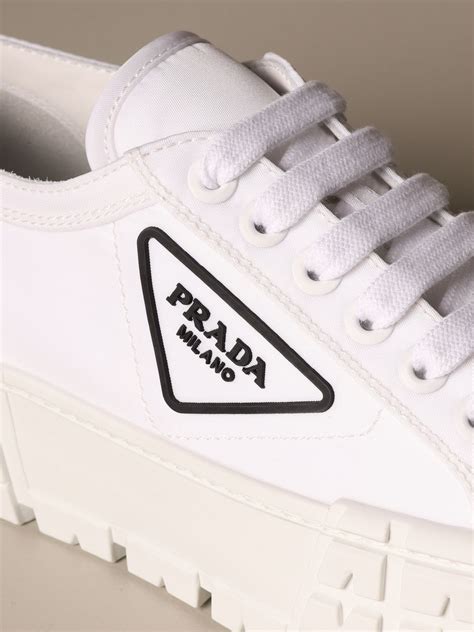 all white Prada sneakers